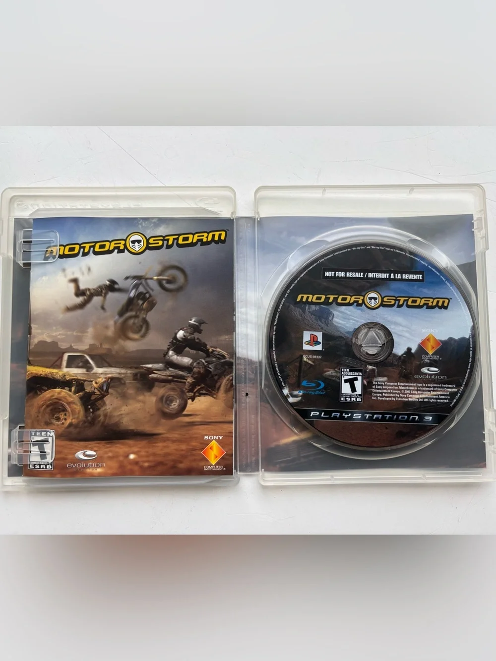 Sony MotorStorm PlayStation 3 Racing Game — White Case with Yellow Logo